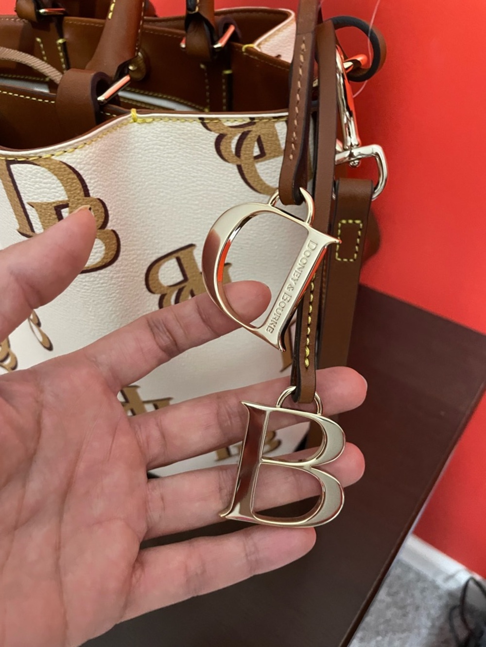 Dooney & Bourke Cream Tote with Tan DB Logo and Trim - Picture 2 of 7